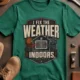 Funny HVAC Technician Tee - “I Fix The Weather Indoors.” Cooling/Furnace Shop Work Shirt — kelly — Flat-lay Funny HVAC Technician Tee - “I Fix The Weather Indoors.” Cooling/Furnace Shop Work Shirt — kelly t-shirt, flat-lay product photo | Pressure Tested Co