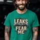 Leaks Fear Me T-Shirt - Funny Plumber Pipes Tee — kelly t-shirt, model photo | Pressure Tested Co