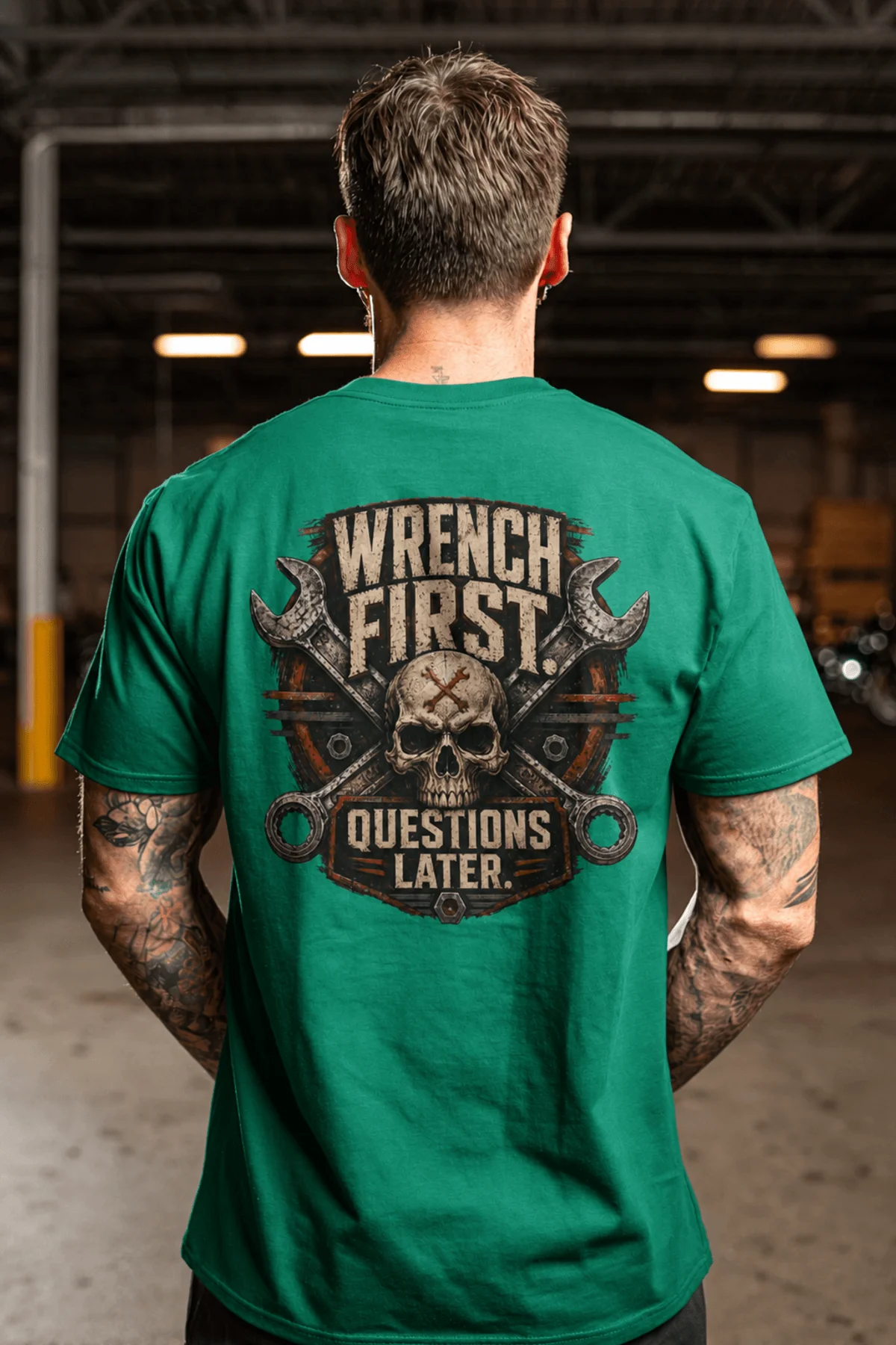 Wrench First Tee — "Wrench First, Questions Later" Mechanic Skull T-Shirt — kelly t-shirt, model photo | Pressure Tested Co