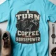 Mechanic Technician T-Shirt — "I Turn Coffee Into Horsepower" Vintage Work Shirt — lagoon-blue — Flat-lay Mechanic Technician T-Shirt — "I Turn Coffee Into Horsepower" Vintage Work Shirt — lagoon-blue t-shirt, flat-lay product photo | Pressure Tested Co