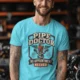 Plumber T-Shirt — "Pipe Doctor. No Appointment Needed" Vintage Work Shirt — lagoon-blue — Model Plumber T-Shirt — "Pipe Doctor. No Appointment Needed" Vintage Work Shirt — lagoon-blue t-shirt, model photo | Pressure Tested Co
