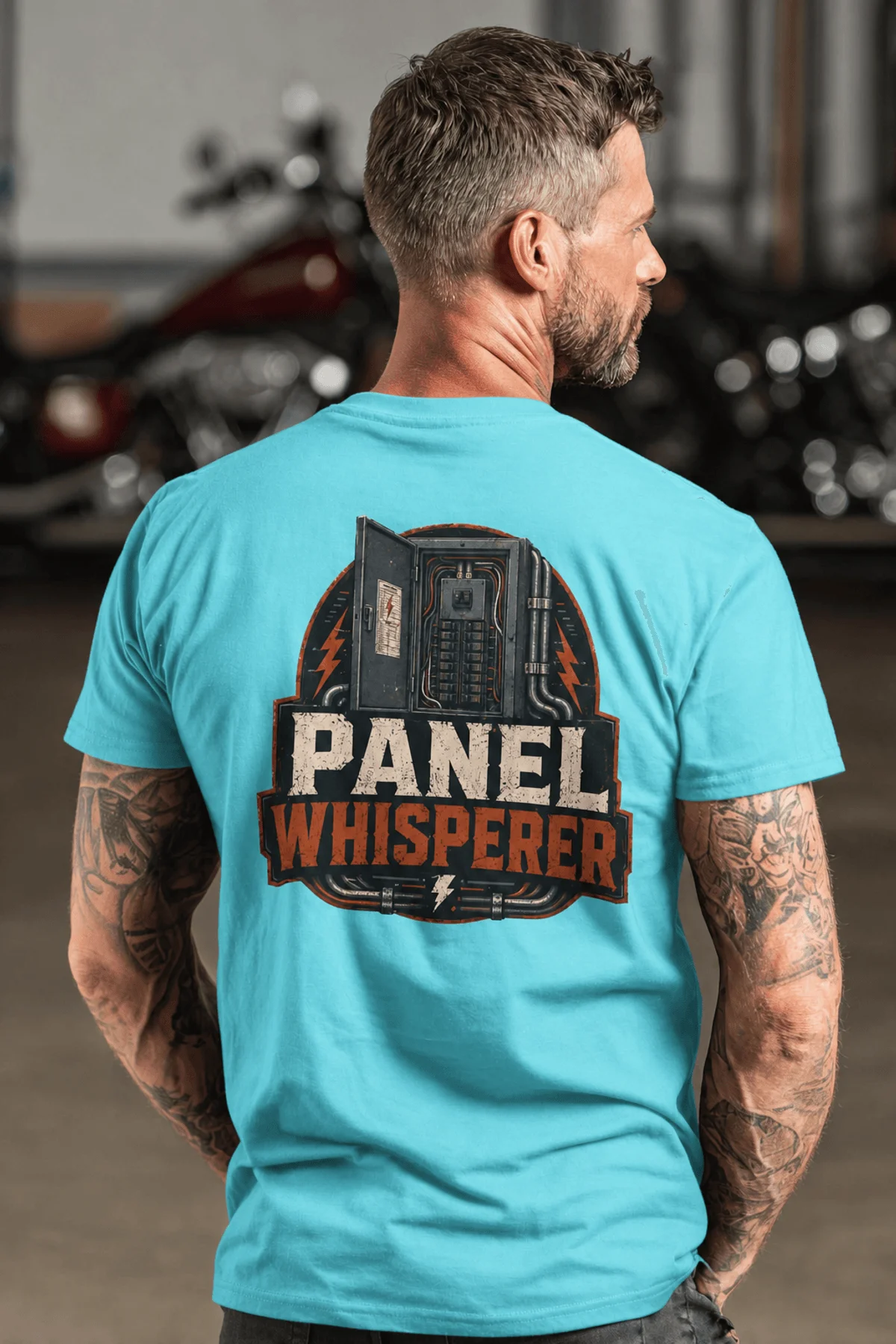 Funny Electrician Tee - "Panel Whisperer" Electrical Worker T-Shirt — lagoon-blue t-shirt, model photo | Pressure Tested Co
