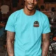 Funny Electrician Tee - "Panel Whisperer" Electrical Worker T-Shirt — lagoon-blue t-shirt, model photo | Pressure Tested Co
