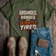 Grounded, Bonded and Slightly Tired Graphic Tee — Funny Electrical Worker Shirt — military-green t-shirt, flat-lay product photo | Pressure Tested Co