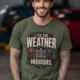 Funny HVAC Technician Tee - “I Fix The Weather Indoors.” Cooling/Furnace Shop Work Shirt — military-green — Model Funny HVAC Technician Tee - “I Fix The Weather Indoors.” Cooling/Furnace Shop Work Shirt — military-green t-shirt, model photo | Pressure Tested Co