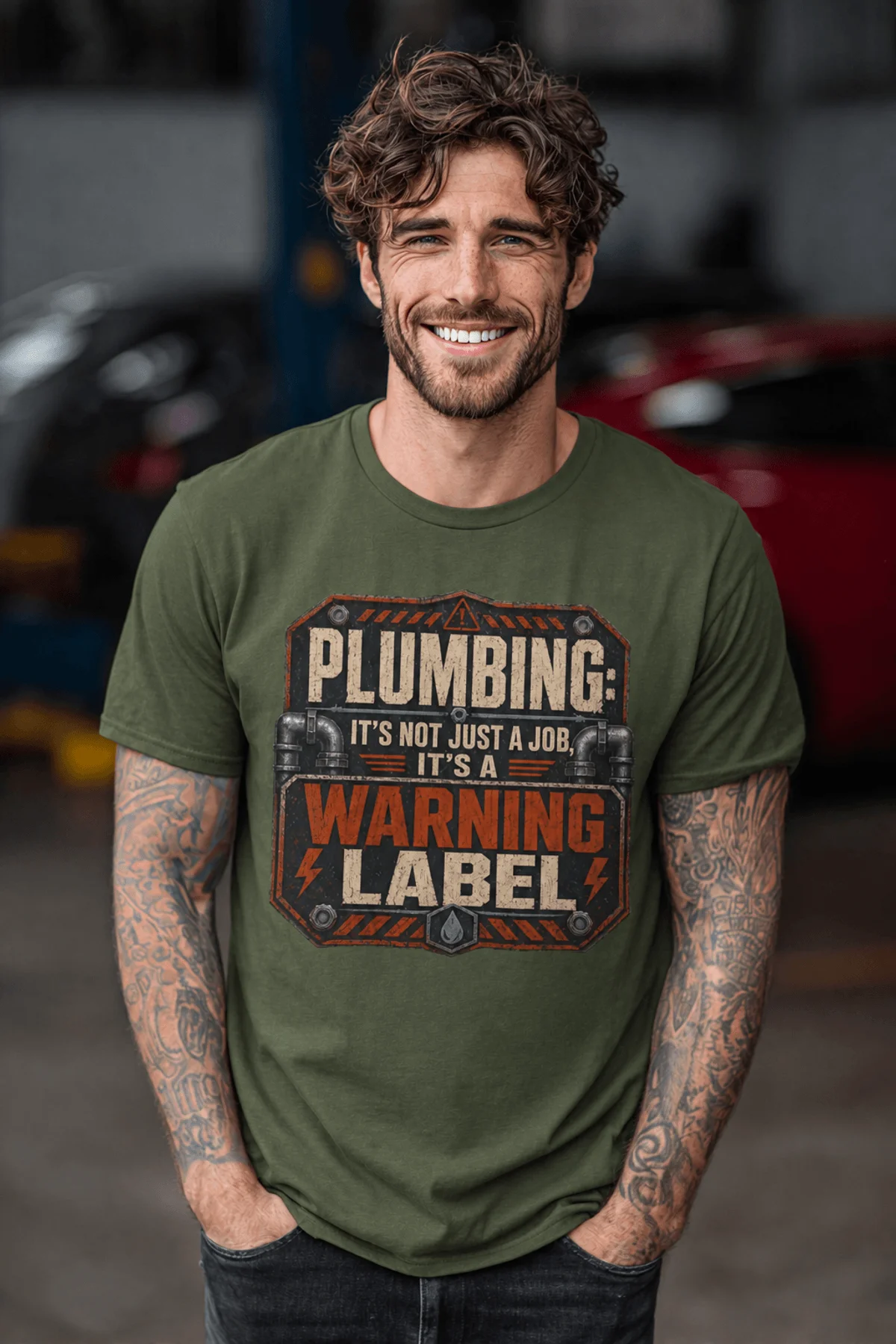 Plumbing Warning Label T-Shirt — Funny Plumber Shirt — military-green t-shirt, model photo | Pressure Tested Co