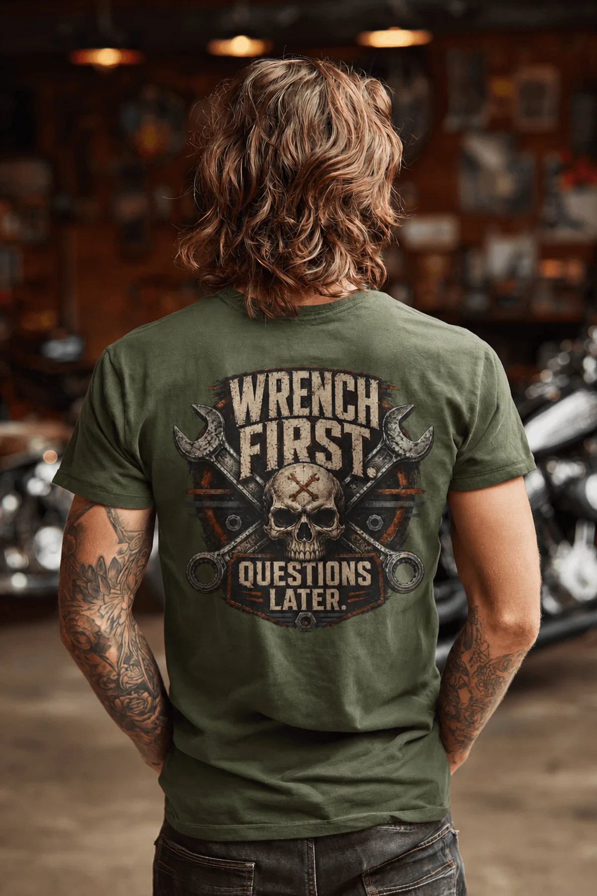Wrench First Tee — "Wrench First, Questions Later" Mechanic Skull T-Shirt — military-green t-shirt, model photo | Pressure Tested Co