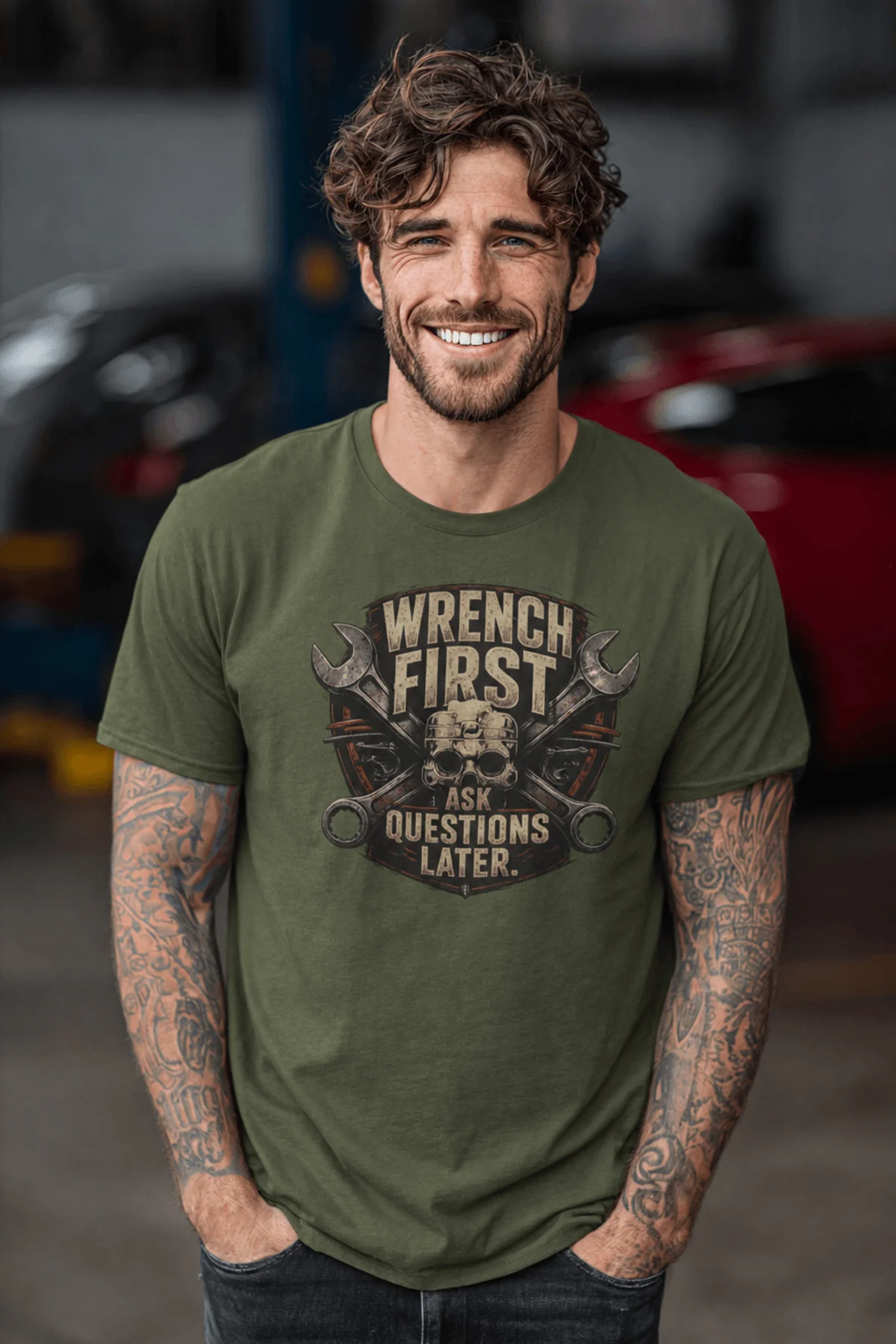 Wrench First Tee — "Wrench First, Questions Later" Mechanic Skull T-Shirt — military-green t-shirt, model photo | Pressure Tested Co