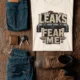 Leaks Fear Me T-Shirt - Funny Plumber Pipes Tee — natural t-shirt, flat-lay product photo | Pressure Tested Co