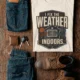 Funny HVAC Technician Tee - “I Fix The Weather Indoors.” Cooling/Furnace Shop Work Shirt — natural — Flat-lay Funny HVAC Technician Tee - “I Fix The Weather Indoors.” Cooling/Furnace Shop Work Shirt — natural t-shirt, flat-lay product photo | Pressure Tested Co