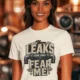 Leaks Fear Me T-Shirt - Funny Plumber Pipes Tee — natural t-shirt, model photo | Pressure Tested Co