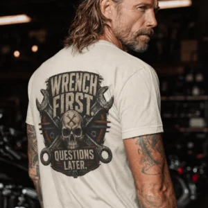 Wrench First Tee — "Wrench First, Questions Later" Mechanic Skull T-Shirt — natural t-shirt, model photo | Pressure Tested Co