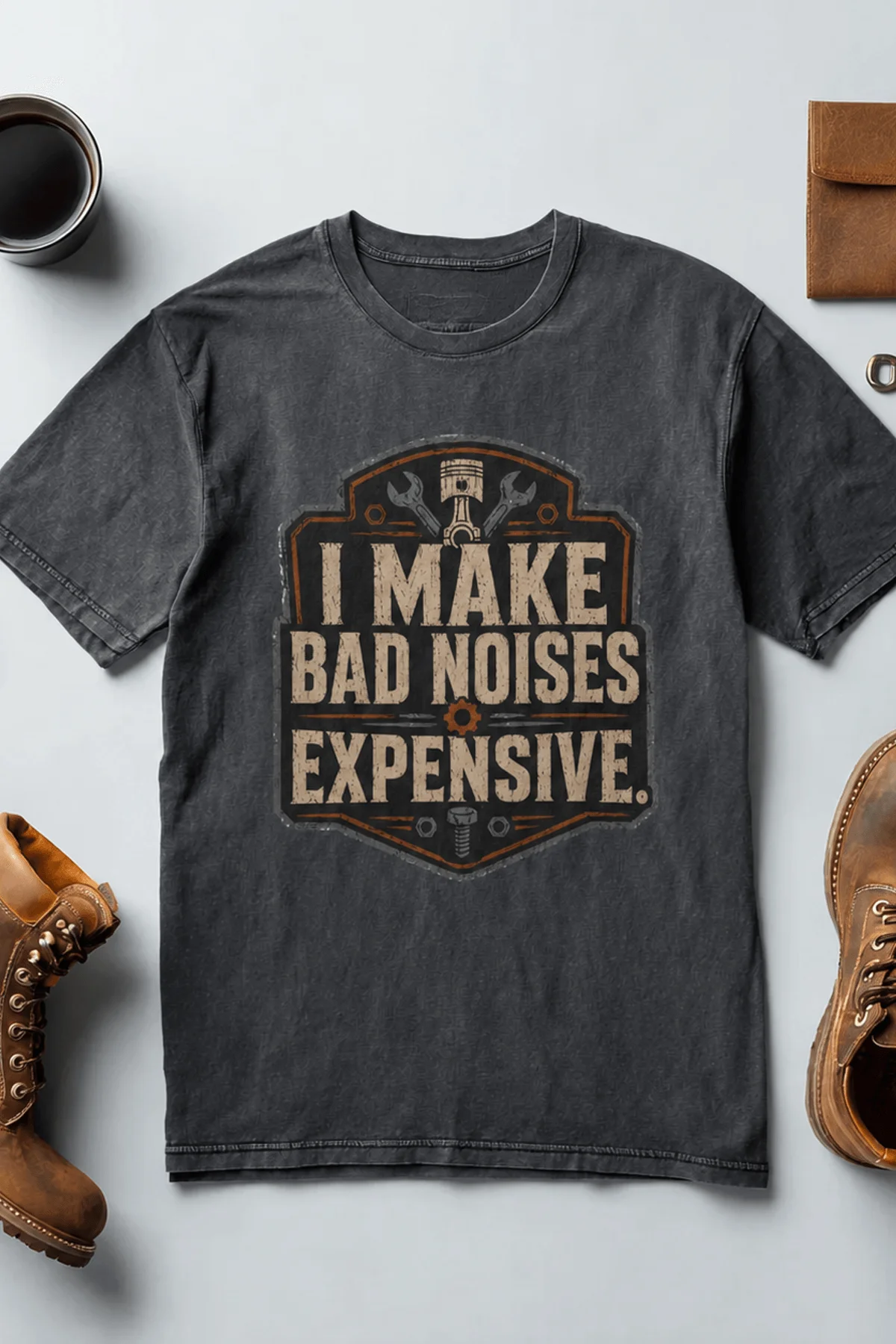 Funny Mechanic Tee - "I Make Bad Noises Expensive" Technician Worker/ Mechanic / Gearhead Tee — navy t-shirt, flat-lay product photo | Pressure Tested Co