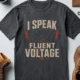 I Speak Fluent Voltage T-Shirt — Electrician & Electronics Tech Gift — navy t-shirt, flat-lay product photo | Pressure Tested Co