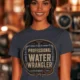 Funny Plumber Tee - "Professional Water Wrangler" Rustic Rope Graphic T-Shirt — navy t-shirt, model photo | Pressure Tested Co