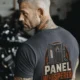 Funny Electrician Tee - "Panel Whisperer" Electrical Worker T-Shirt — navy t-shirt, model photo | Pressure Tested Co