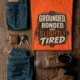 Grounded, Bonded and Slightly Tired Graphic Tee — Funny Electrical Worker Shirt — orange t-shirt, flat-lay product photo | Pressure Tested Co