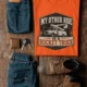 Bucket Truck T-Shirt - “My Other Ride Is A Bucket Truck” Utility Crew/Electrician Tee — orange t-shirt, flat-lay product photo | Pressure Tested Co