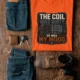 HVAC Technician Tee — “THE COIL WAS DIRTY. SO WAS MY MOOD.” — orange — Flat-lay HVAC Technician Tee — “THE COIL WAS DIRTY. SO WAS MY MOOD.” — orange t-shirt, flat-lay product photo | Pressure Tested Co