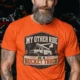 Bucket Truck T-Shirt - “My Other Ride Is A Bucket Truck” Utility Crew/Electrician Tee — orange t-shirt, model photo | Pressure Tested Co