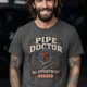 Plumber T-Shirt — "Pipe Doctor. No Appointment Needed" Vintage Work Shirt — pepper — Model Plumber T-Shirt — "Pipe Doctor. No Appointment Needed" Vintage Work Shirt — pepper t-shirt, model photo | Pressure Tested Co