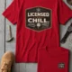 Funny HVAC Tee - "Licensed To Chill" HVAC Technician T-Shirt — red t-shirt, flat-lay product photo | Pressure Tested Co