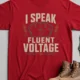 I Speak Fluent Voltage T-Shirt — Electrician & Electronics Tech Gift — red t-shirt, flat-lay product photo | Pressure Tested Co