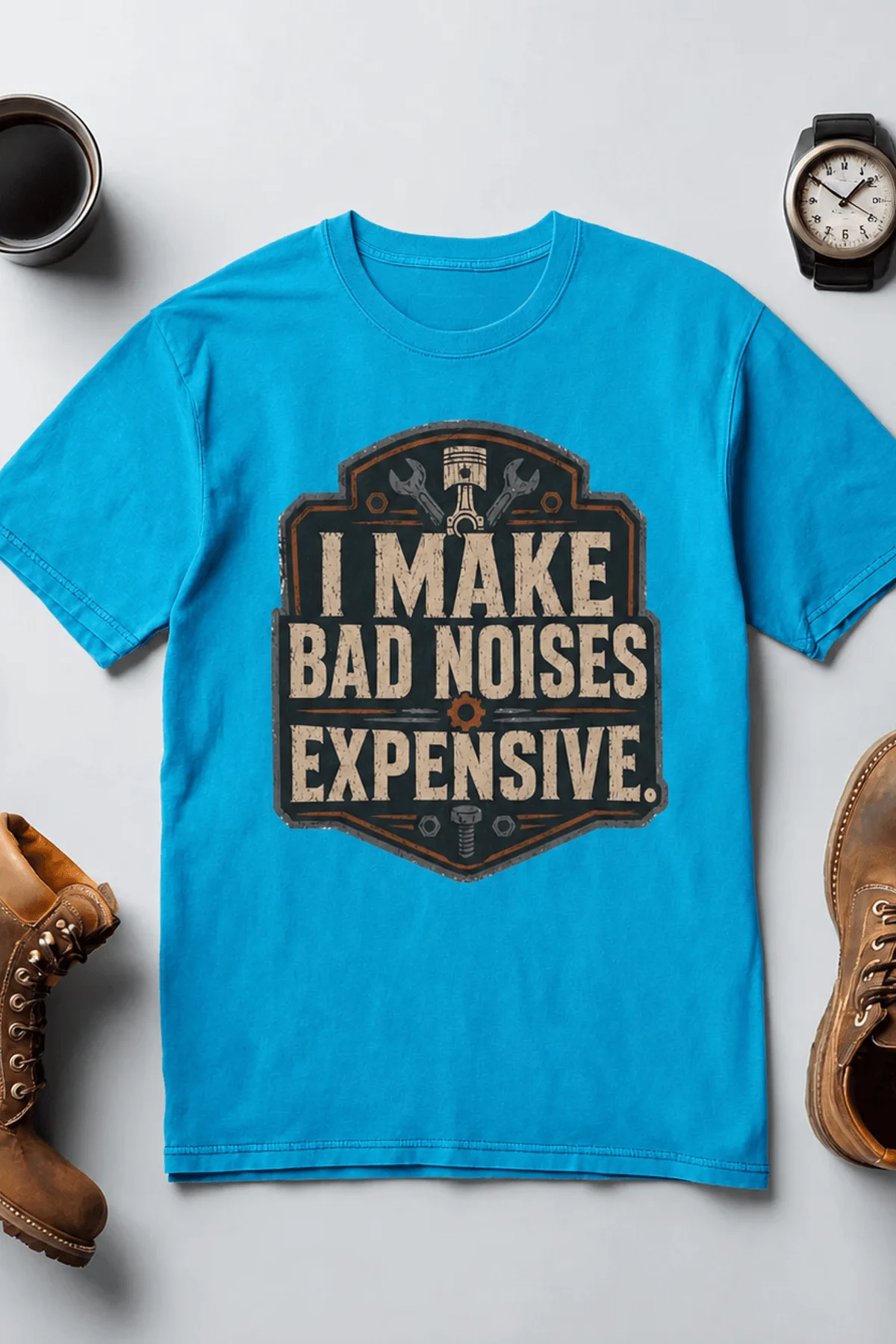 Funny Mechanic Tee - "I Make Bad Noises Expensive" Technician Worker/ Mechanic / Gearhead Tee — sapphire t-shirt, flat-lay product photo | Pressure Tested Co