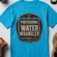 Funny Plumber Tee - "Professional Water Wrangler" Rustic Rope Graphic T-Shirt — sapphire t-shirt, flat-lay product photo | Pressure Tested Co