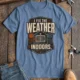 Funny HVAC Technician Tee - “I Fix The Weather Indoors.” Cooling/Furnace Shop Work Shirt — steel-blue — Flat-lay Funny HVAC Technician Tee - “I Fix The Weather Indoors.” Cooling/Furnace Shop Work Shirt — steel-blue t-shirt, flat-lay product photo | Pressure Tested Co