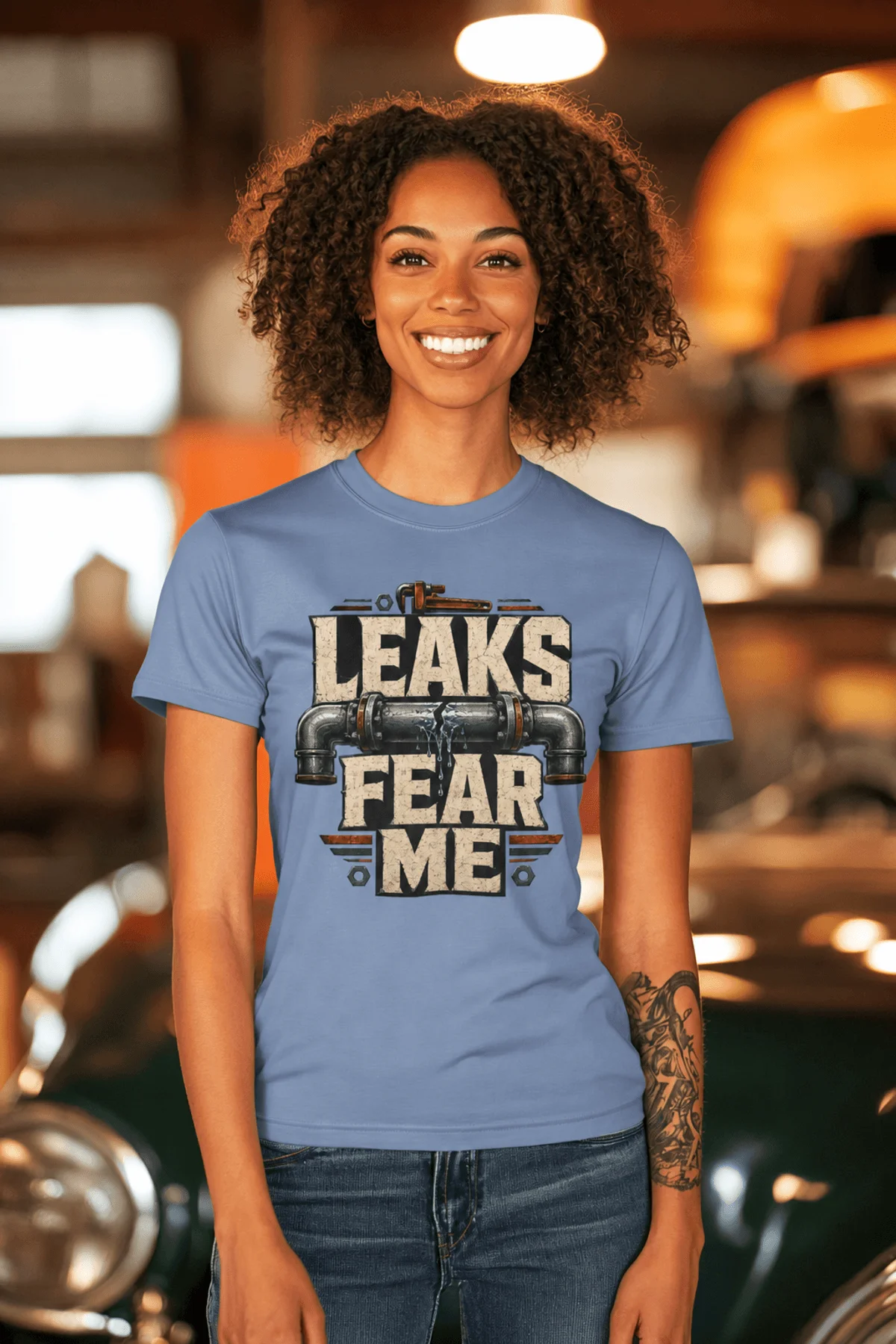 Leaks Fear Me T-Shirt - Funny Plumber Pipes Tee — steel-blue t-shirt, model photo | Pressure Tested Co