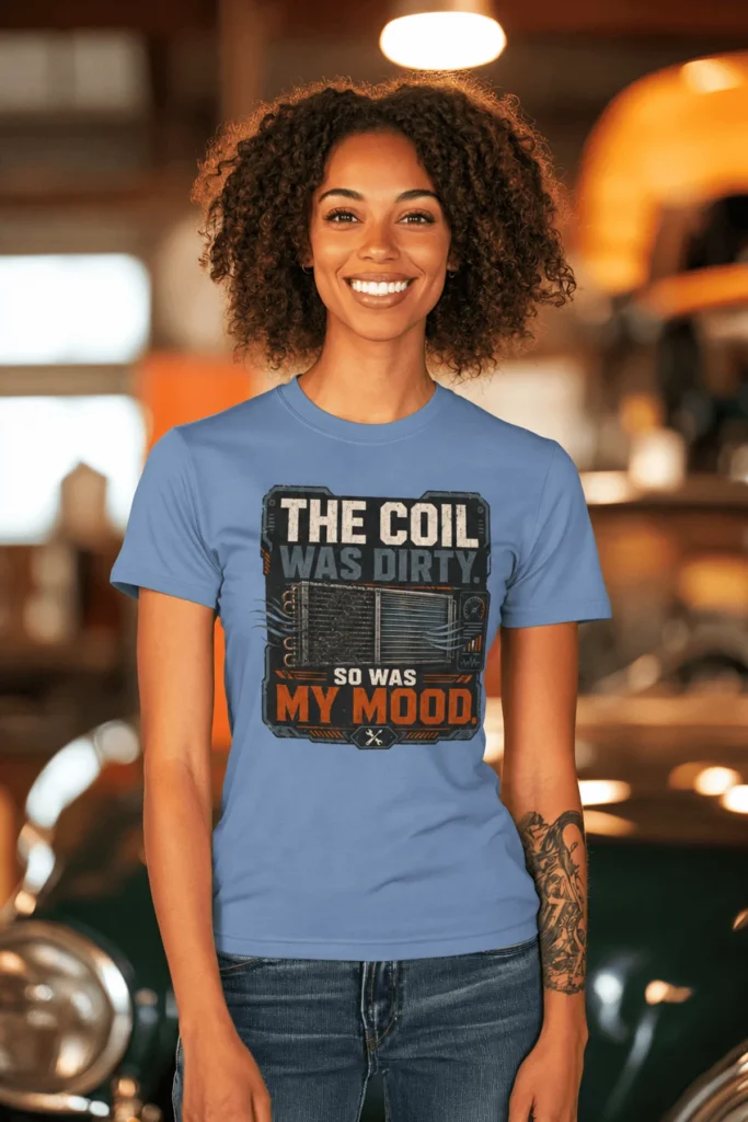 HVAC Technician Tee — “THE COIL WAS DIRTY. SO WAS MY MOOD.” — steel-blue t-shirt, model photo | Pressure Tested Co