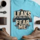 Leaks Fear Me T-Shirt - Funny Plumber Pipes Tee — turquoise t-shirt, flat-lay product photo | Pressure Tested Co