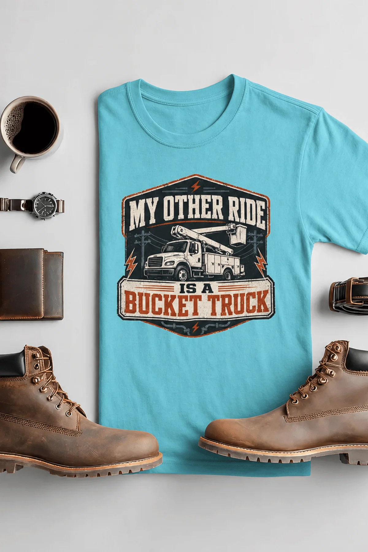 Bucket Truck T-Shirt - “My Other Ride Is A Bucket Truck” Utility Crew/Electrician Tee — turquoise t-shirt, flat-lay product photo | Pressure Tested Co