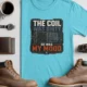 HVAC Technician Tee — “THE COIL WAS DIRTY. SO WAS MY MOOD.” — turquoise — Flat-lay HVAC Technician Tee — “THE COIL WAS DIRTY. SO WAS MY MOOD.” — turquoise t-shirt, flat-lay product photo | Pressure Tested Co