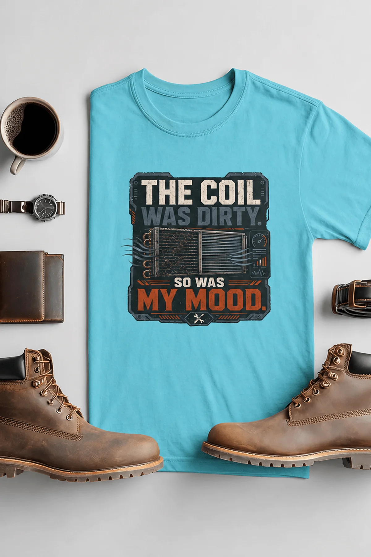 HVAC Technician Tee — “THE COIL WAS DIRTY. SO WAS MY MOOD.” — turquoise — Flat-lay HVAC Technician Tee — “THE COIL WAS DIRTY. SO WAS MY MOOD.” — turquoise t-shirt, flat-lay product photo | Pressure Tested Co