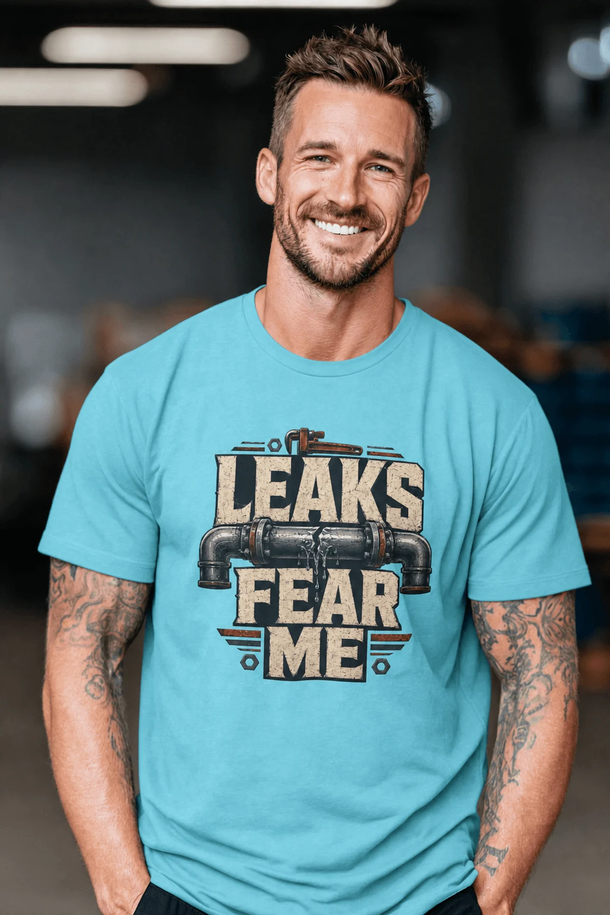 Leaks Fear Me T-Shirt - Funny Plumber Pipes Tee — turquoise t-shirt, model photo | Pressure Tested Co