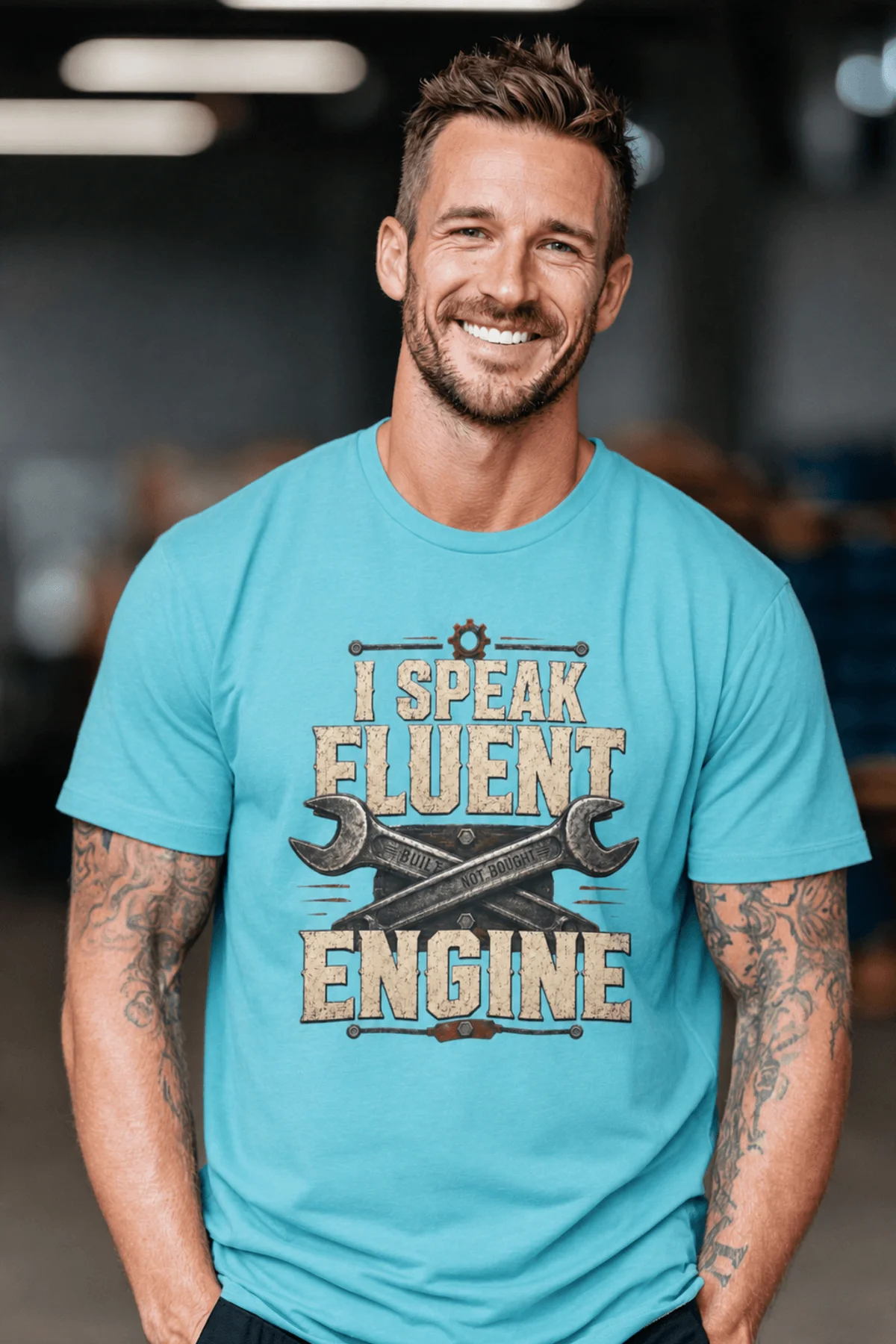 I Speak Fluent Engine T-Shirt — Mechanic Wrench Vintage Auto Repair Tee — turquoise — Model I Speak Fluent Engine T-Shirt — Mechanic Wrench Vintage Auto Repair Tee — turquoise t-shirt, model photo | Pressure Tested Co