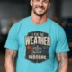 Funny HVAC Technician Tee - “I Fix The Weather Indoors.” Cooling/Furnace Shop Work Shirt — turquoise — Model Funny HVAC Technician Tee - “I Fix The Weather Indoors.” Cooling/Furnace Shop Work Shirt — turquoise t-shirt, model photo | Pressure Tested Co