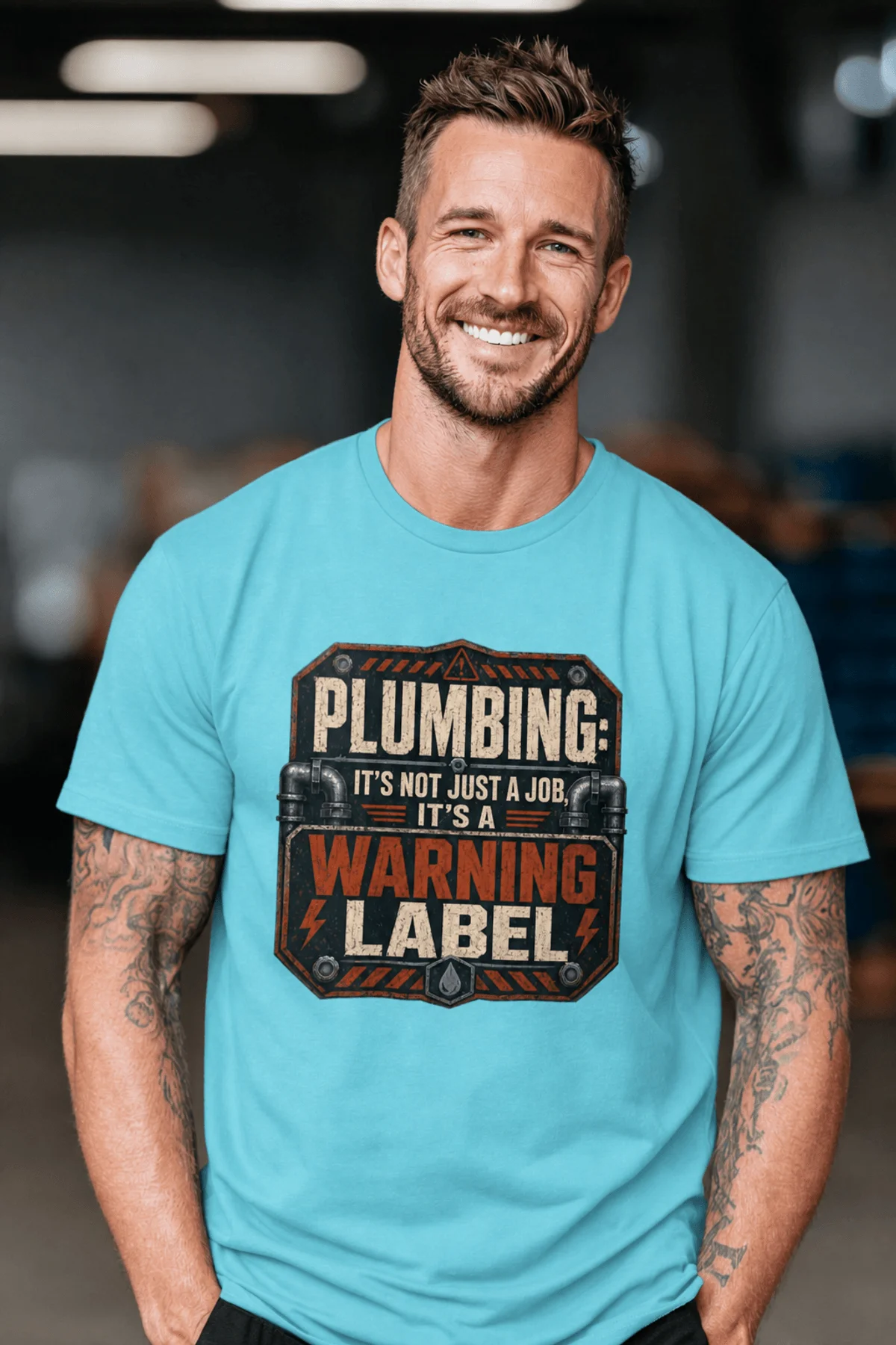 Plumbing Warning Label T-Shirt — Funny Plumber Shirt — turquoise t-shirt, model photo | Pressure Tested Co