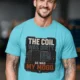 HVAC Technician Tee — “THE COIL WAS DIRTY. SO WAS MY MOOD.” — turquoise — Model HVAC Technician Tee — “THE COIL WAS DIRTY. SO WAS MY MOOD.” — turquoise t-shirt, model photo | Pressure Tested Co