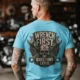 Wrench First Tee — "Wrench First, Questions Later" Mechanic Skull T-Shirt — turquoise t-shirt, model photo | Pressure Tested Co