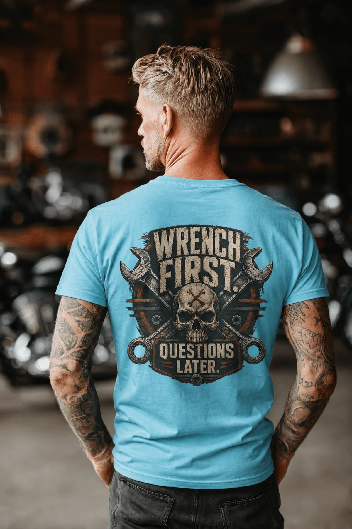 Wrench First Tee — "Wrench First, Questions Later" Mechanic Skull T-Shirt — turquoise t-shirt, model photo | Pressure Tested Co