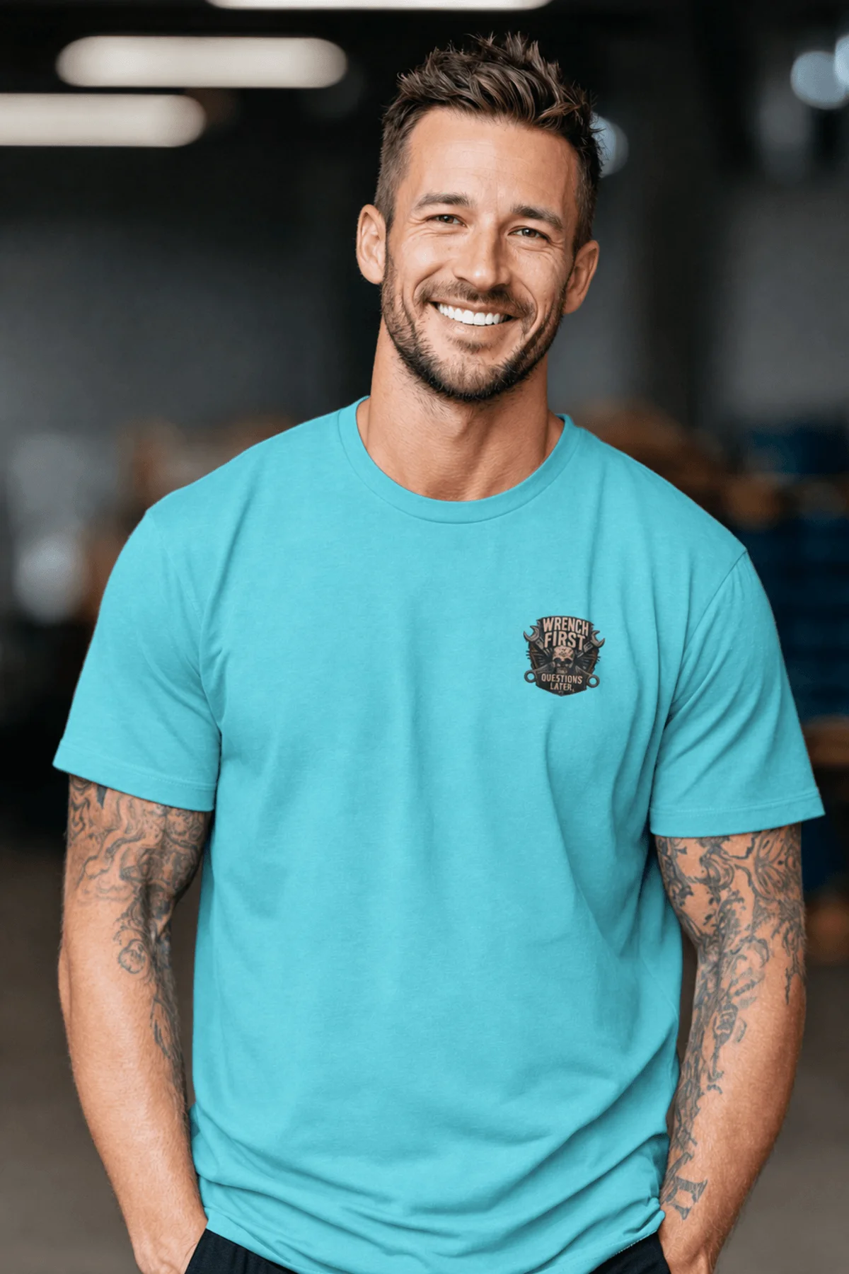Wrench First Tee — "Wrench First, Questions Later" Mechanic Skull T-Shirt — turquoise t-shirt, model photo | Pressure Tested Co