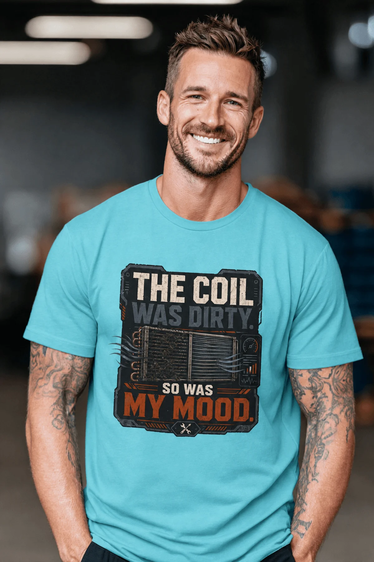 HVAC Technician Tee — “THE COIL WAS DIRTY. SO WAS MY MOOD.” — turquoise — Model HVAC Technician Tee — “THE COIL WAS DIRTY. SO WAS MY MOOD.” — turquoise t-shirt, model photo | Pressure Tested Co