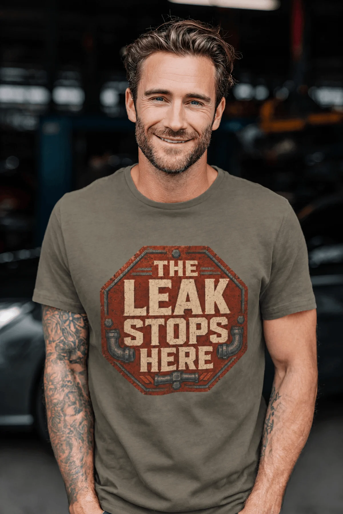 "The Leak Stops Here" Stop Sign Badge Style — Plumbing Repair Tech Humorous Tee — army t-shirt, model photo | Pressure Tested Co
