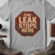 "The Leak Stops Here" Stop Sign Badge Style — Plumbing Repair Tech Humorous Tee — athletic-heather t-shirt, flat-lay product photo | Pressure Tested Co