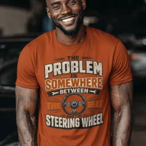 Driving Humor T-Shirt — "The Problem Is Somewhere Between The Seat And The Steering Wheel" — autumn t-shirt, model photo | Pressure Tested Co