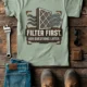 T-Shirt — "Filter First. Ask Questions Later." HVAC Air Filter Graphic — bay t-shirt, flat-lay product photo | Pressure Tested Co