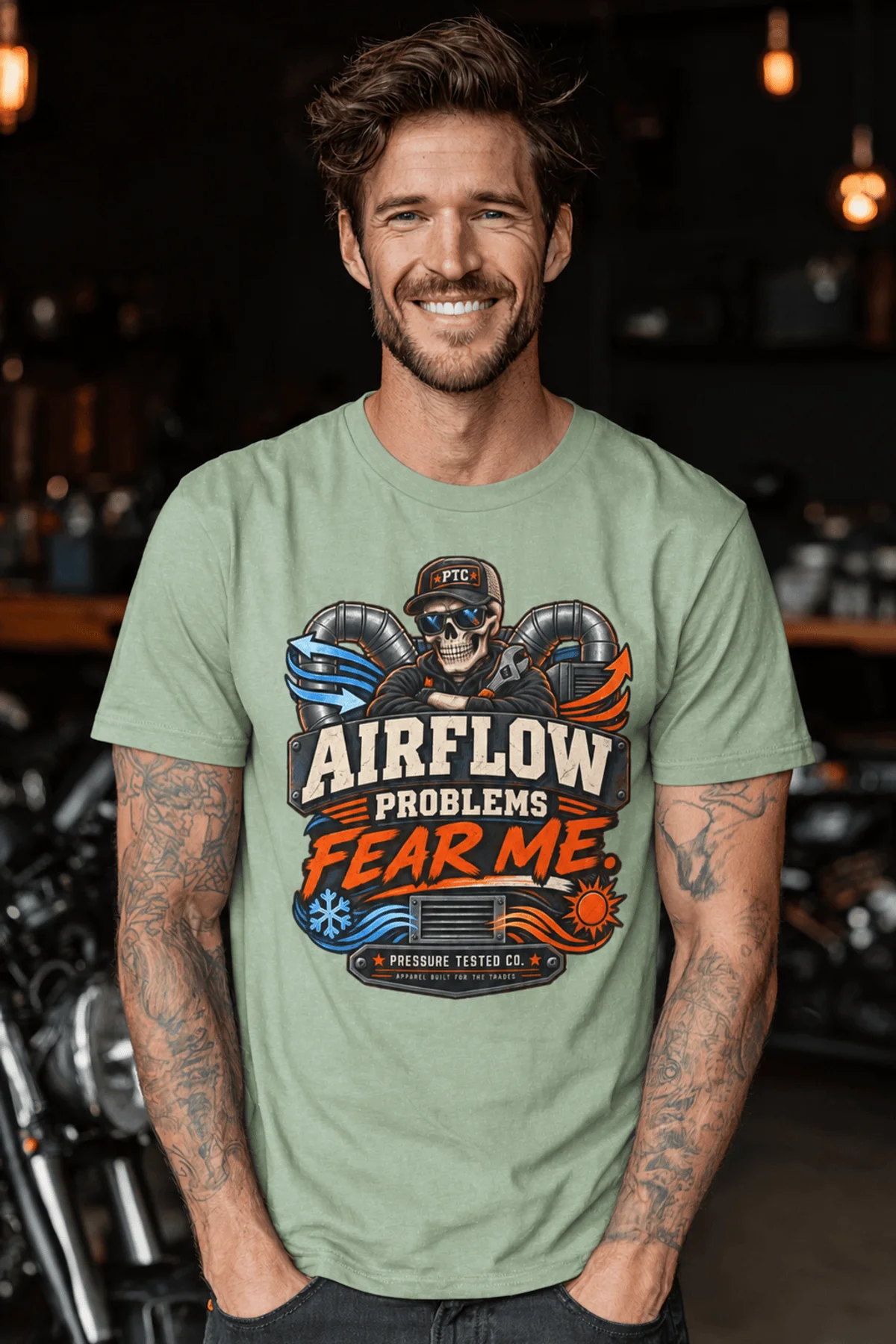 Airflow Problems Fear Me T-Shirt — HVAC Technician Skull Logo Tee — bay t-shirt, model photo | Pressure Tested Co